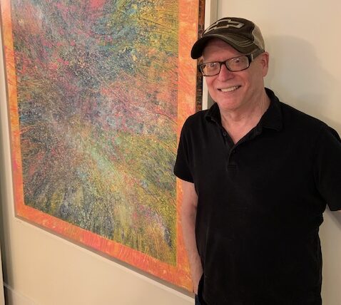 Jerry Hopkins with his favorite piece of his work - Spring Awakening. 